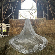 Cathedral length wedding veil with bespoke stitch appliqued embroidered horses